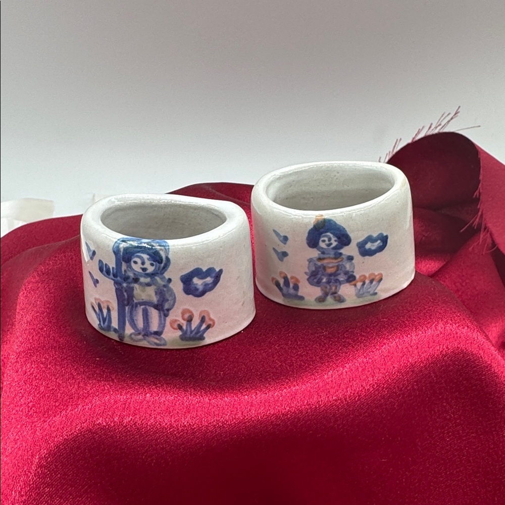 Hand-painted stoneware napkin rings from the M.A. Hadley "Country Scene Blue"